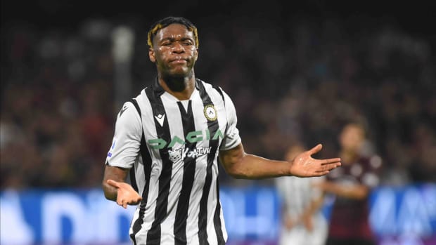 Destiny Udogie pictured celebrating after scoring a goal for Udinese in May 2022